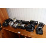 A quantity of various digital cameras and binocula