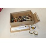 A box of various costume jewellery