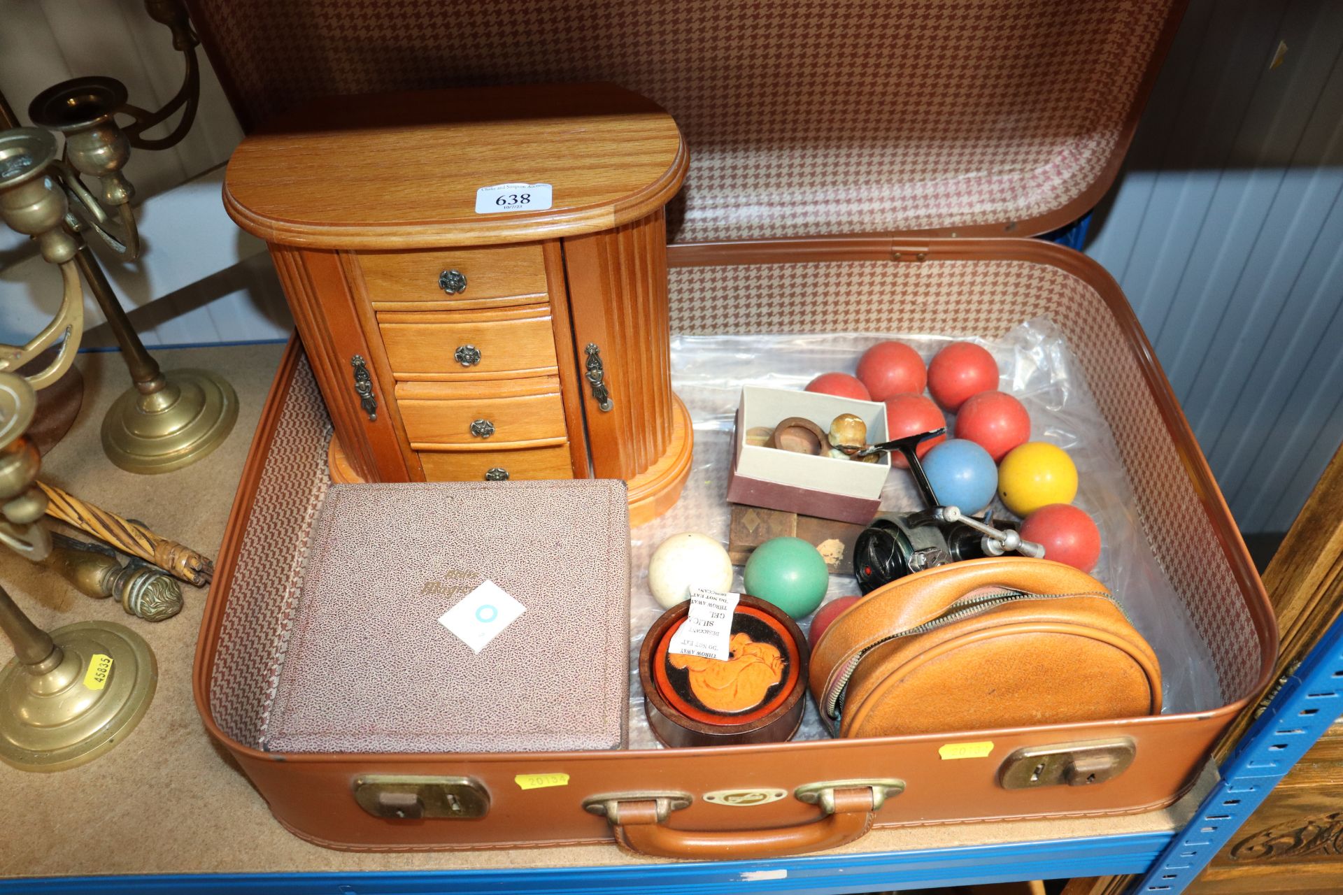 A suitcase and contents of a jewellery chest, snoo