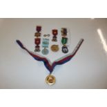 A tub of various Masonic medals