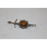 A silver and Scottish citrine Celtic sword and shi