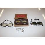 A Triple X motor goggles box and contents of vinta