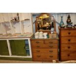 An early 20th Century light oak dressing chest wit