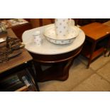 A Victorian demi-lune marble topped washstand