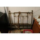 A brass and iron single bed frame