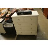 A white painted pine chest fitted two short and th