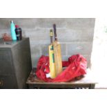 A cricket bag and contents of two cricket bats, cr