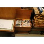 A sewing box and contents