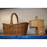 A wicker stair basket and a wicker log basket