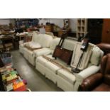 An upholstered three seater settee; a two seater s
