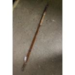 A split cane three section fishing rod
