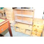 A modern light oak coffee table fitted two drawers