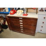 A plans chest fitted seven drawers