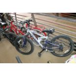 A child's Apollo FS.20 mountain bike with front an