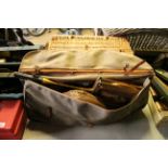 A vintage Slazenger sports bag and contents of leather rugby ball, badminton racquet and net etc.