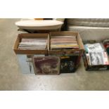 Two boxes of records, mainly rock LPs