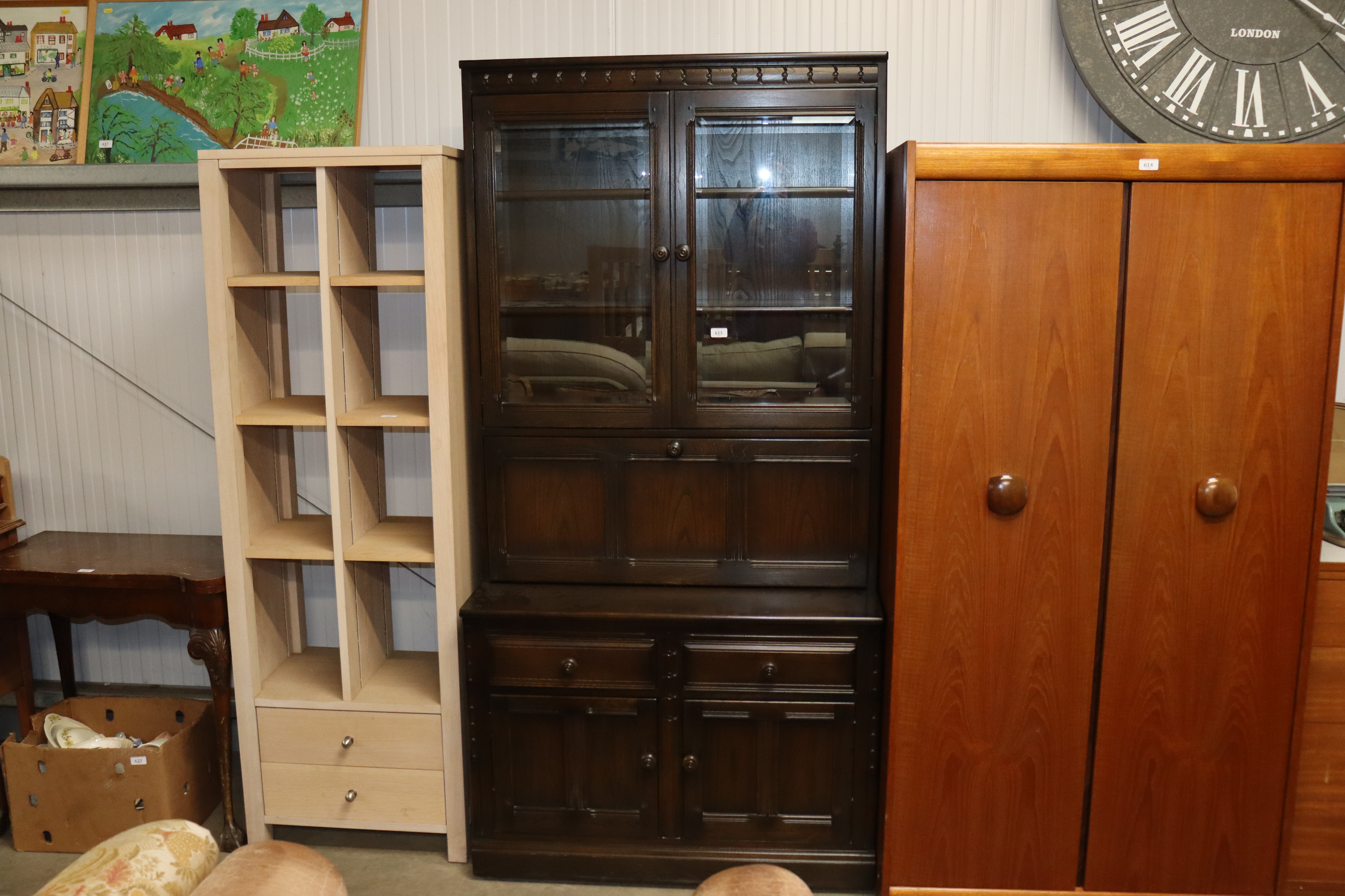 An Ercol side cabinet with its upper section enclo