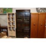 An Ercol side cabinet with its upper section enclo