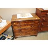 A 19th Century mahogany chest fitted with brushing