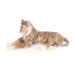 A Royal Copenhagen figure of a recumbent tiger, 31cm long