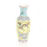 A Chinese finely painted yellow ground baluster vase, with five dragons decoration, seal mark to