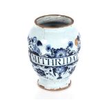 An early 18th Century London Delft drug jar of ovoid form, painted in blue and inscribed "Mithridat"