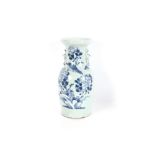 A large Chinese celadon ground porcelain vase, decorated with a bird and flowers in underglaze blue,