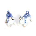 A pair of Oriental blue and white porcelain Fo dog figures, 10cm long x 7cm high overall