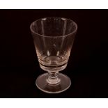 A 19th Century glass rummer, of large size, the bucket shaped bowl raised on a baluster column and