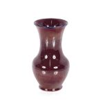 A Moorcroft purple lustre vase, of baluster form circa 1920, 21cm high