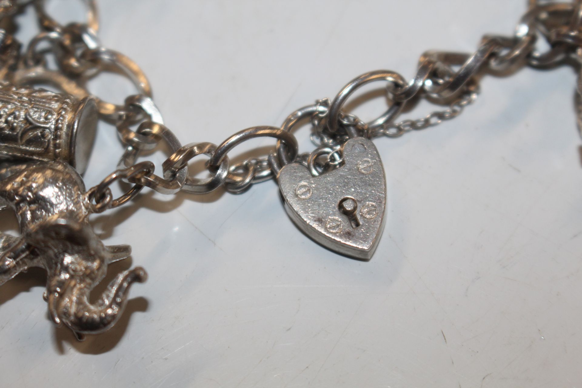 A Sterling silver charm bracelet approx. 57gms - Image 2 of 15