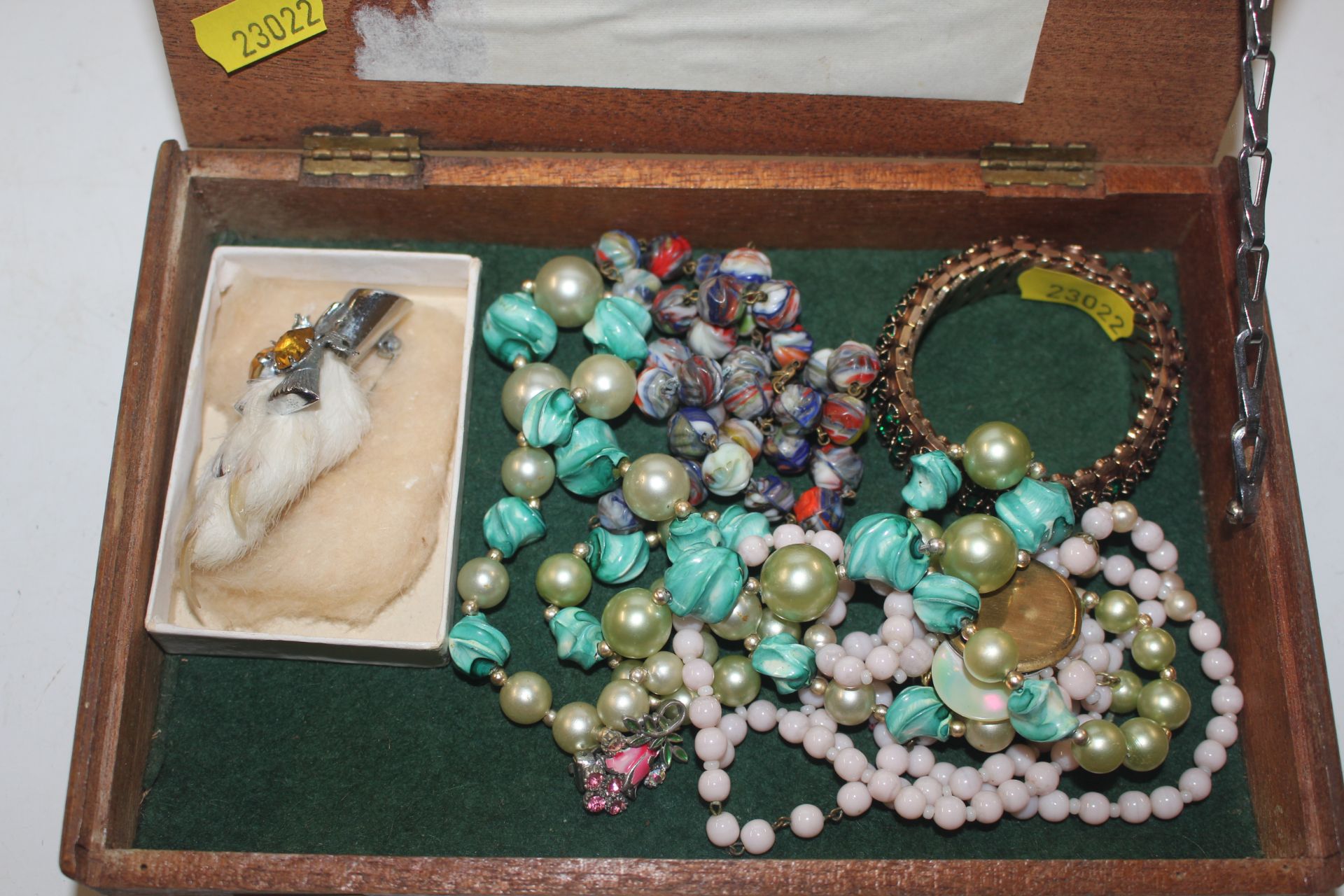 A box of various costume jewellery