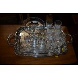 A silver plated twin handled tray and a quantity o