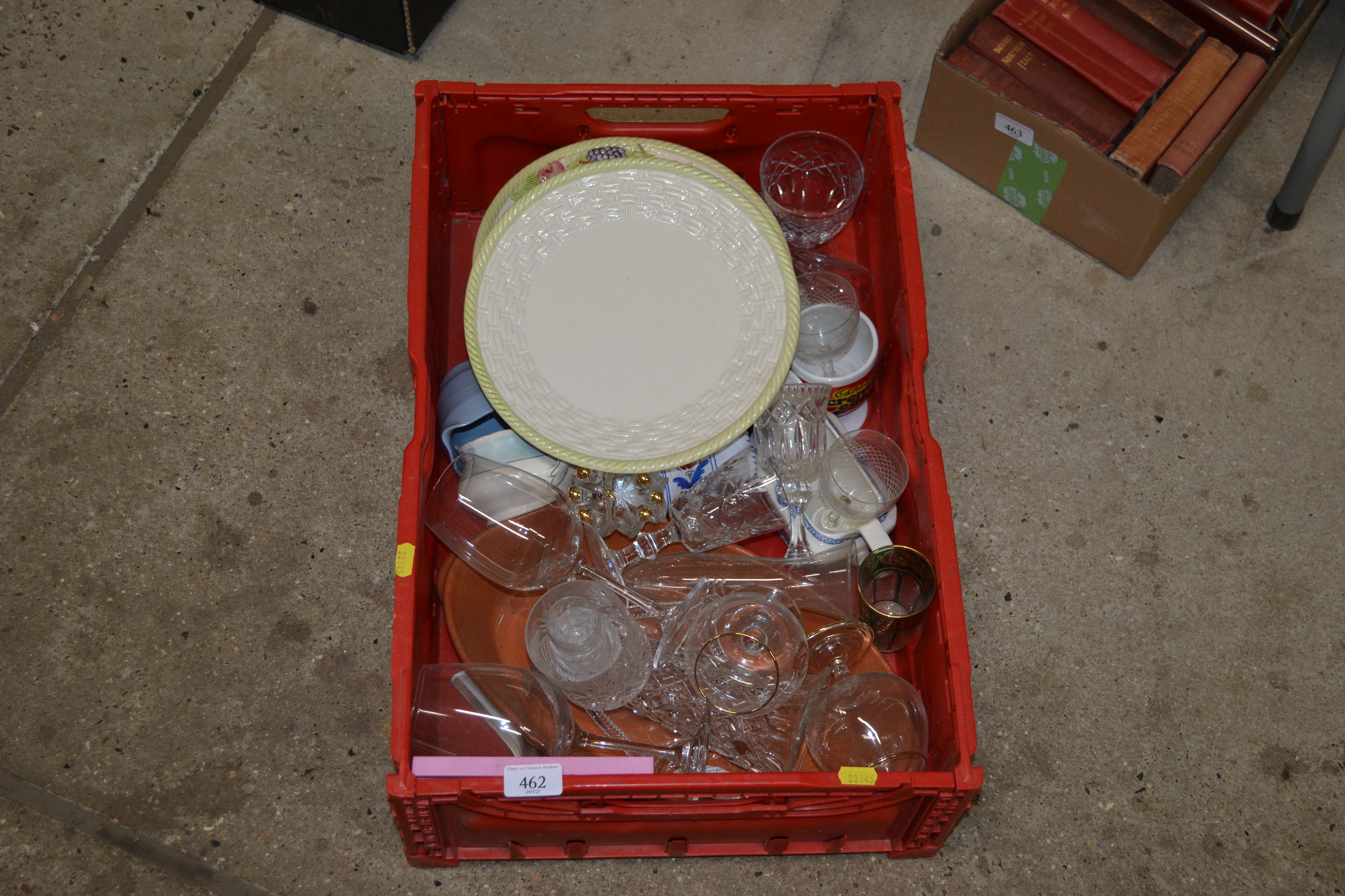 A box containing various miscellaneous table glass