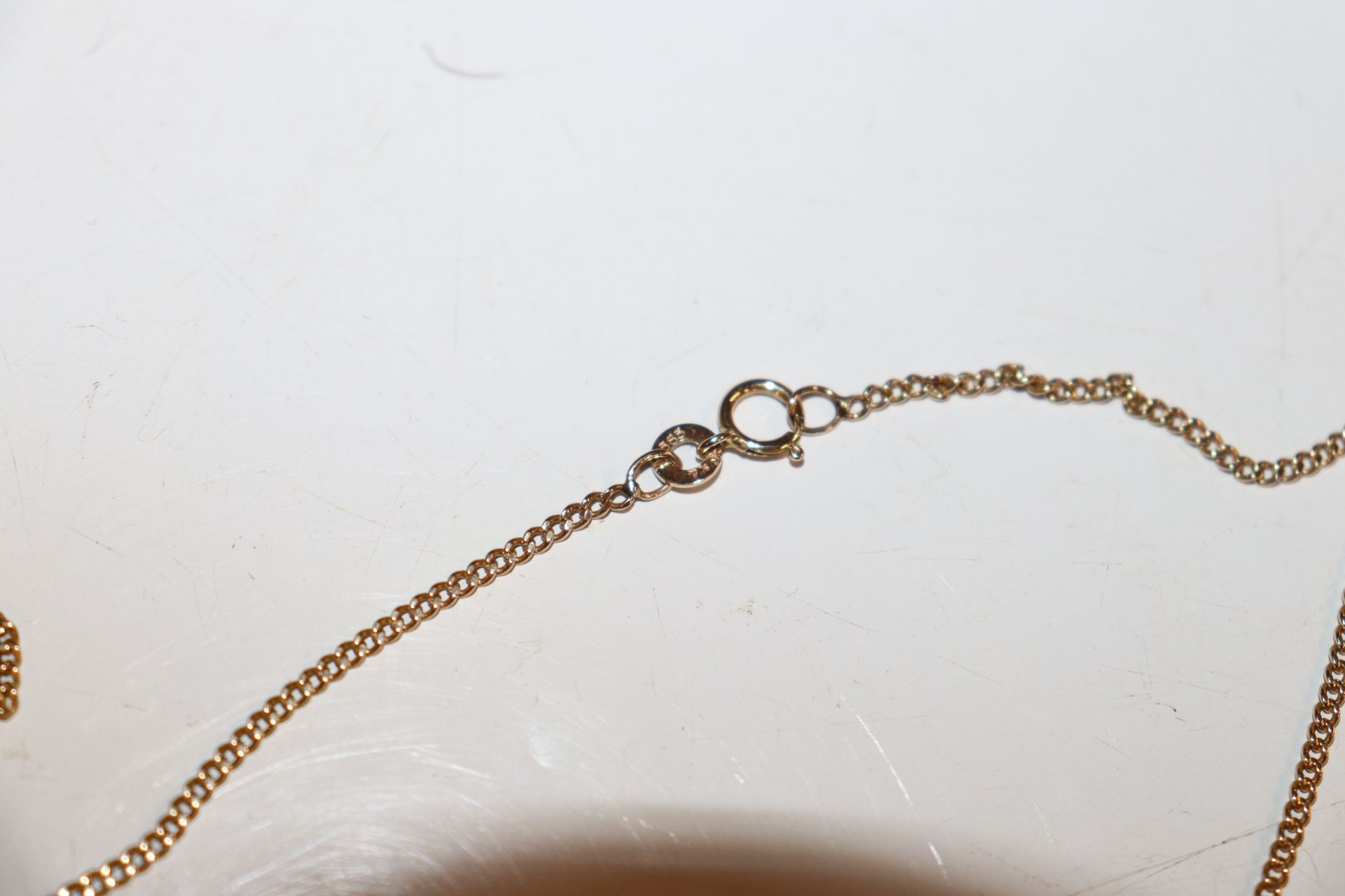 A 14ct gold fine link chain, approx. 5gms and a 14 - Image 2 of 8