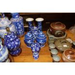 A pair of blue and white Oriental vases, circle m