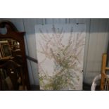 A unstretched canvas depicting pink almond blossom