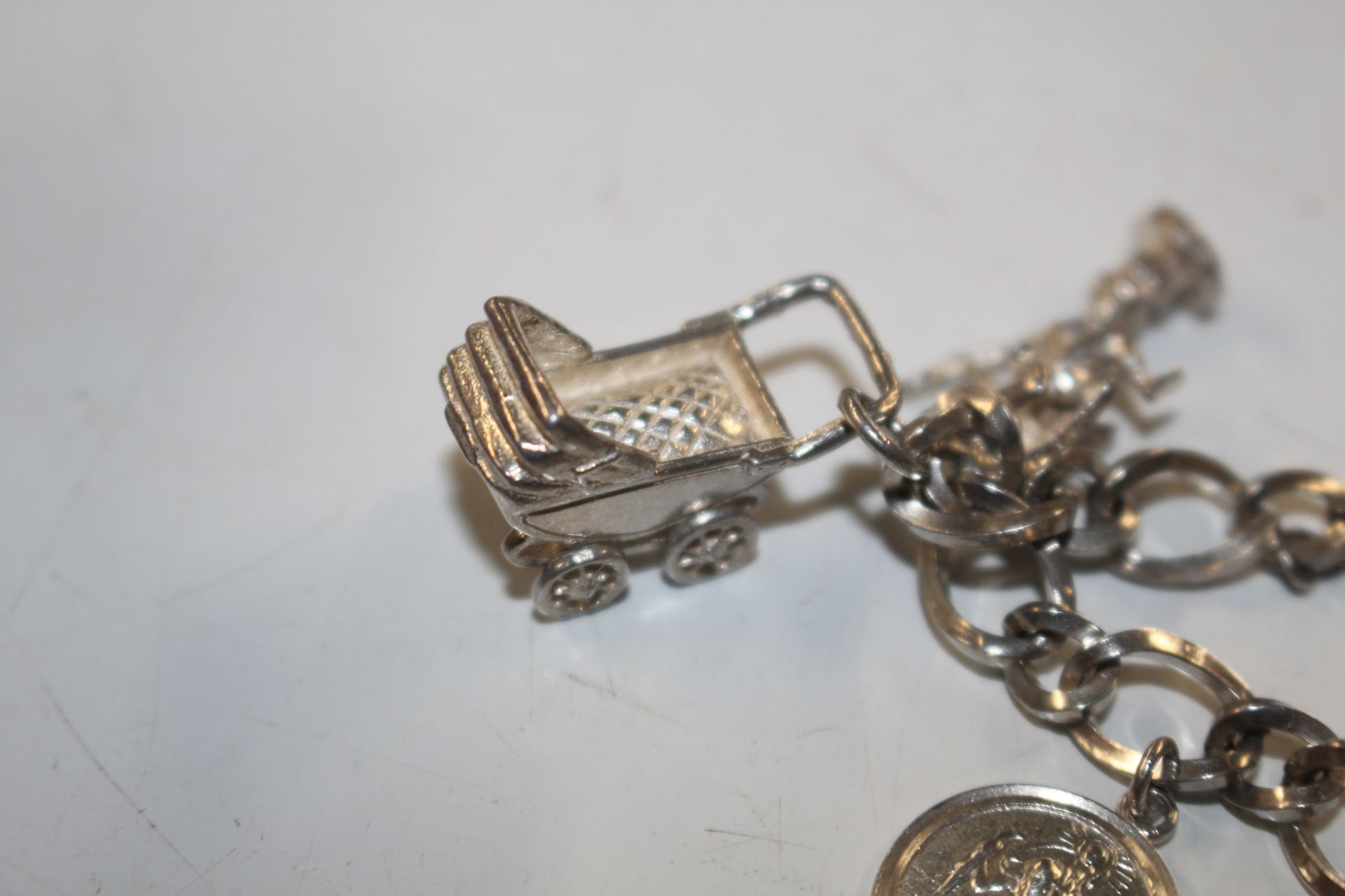 A Sterling silver charm bracelet approx. 57gms - Image 14 of 15