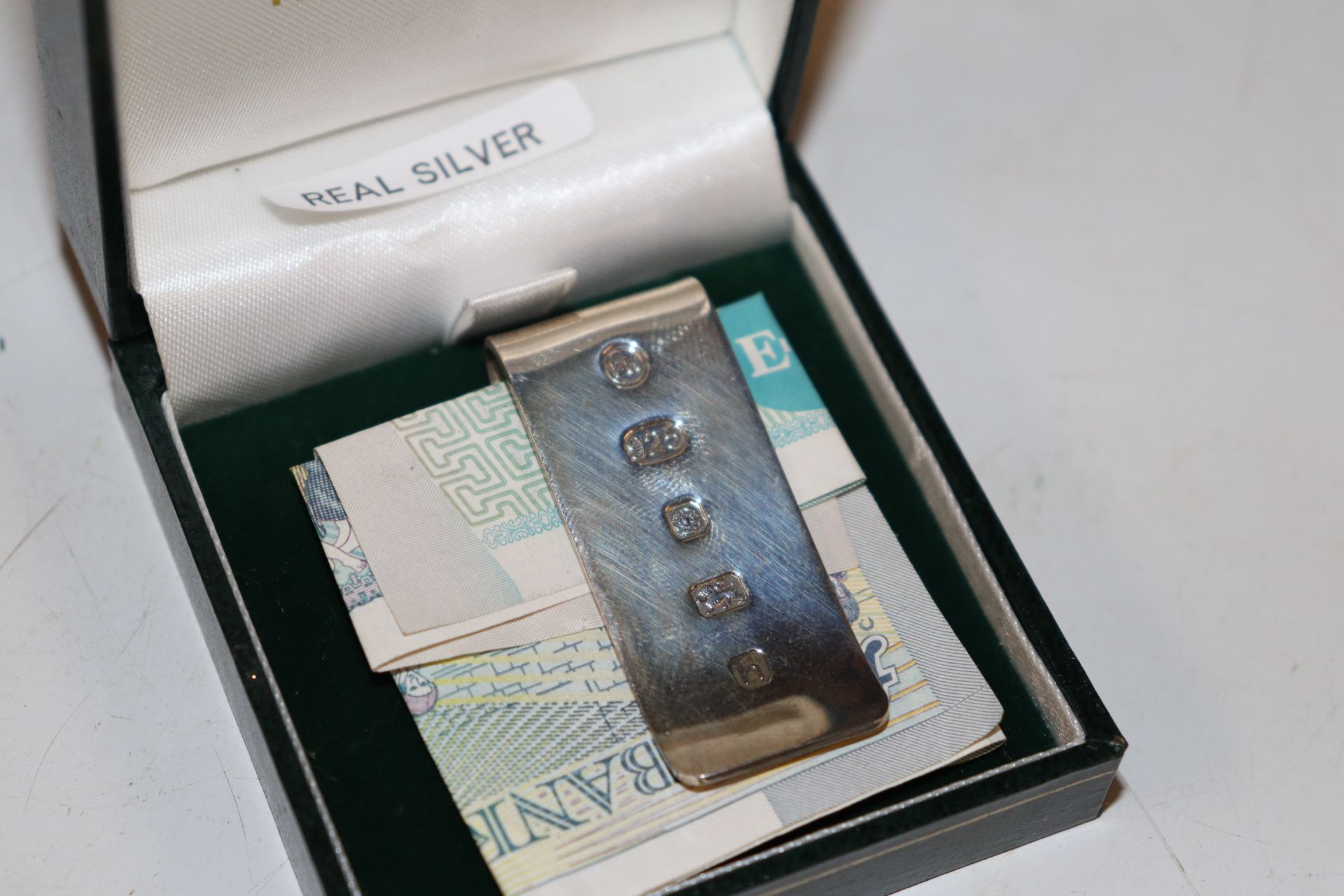 A silver cased travelling clock and a silver money - Image 2 of 5