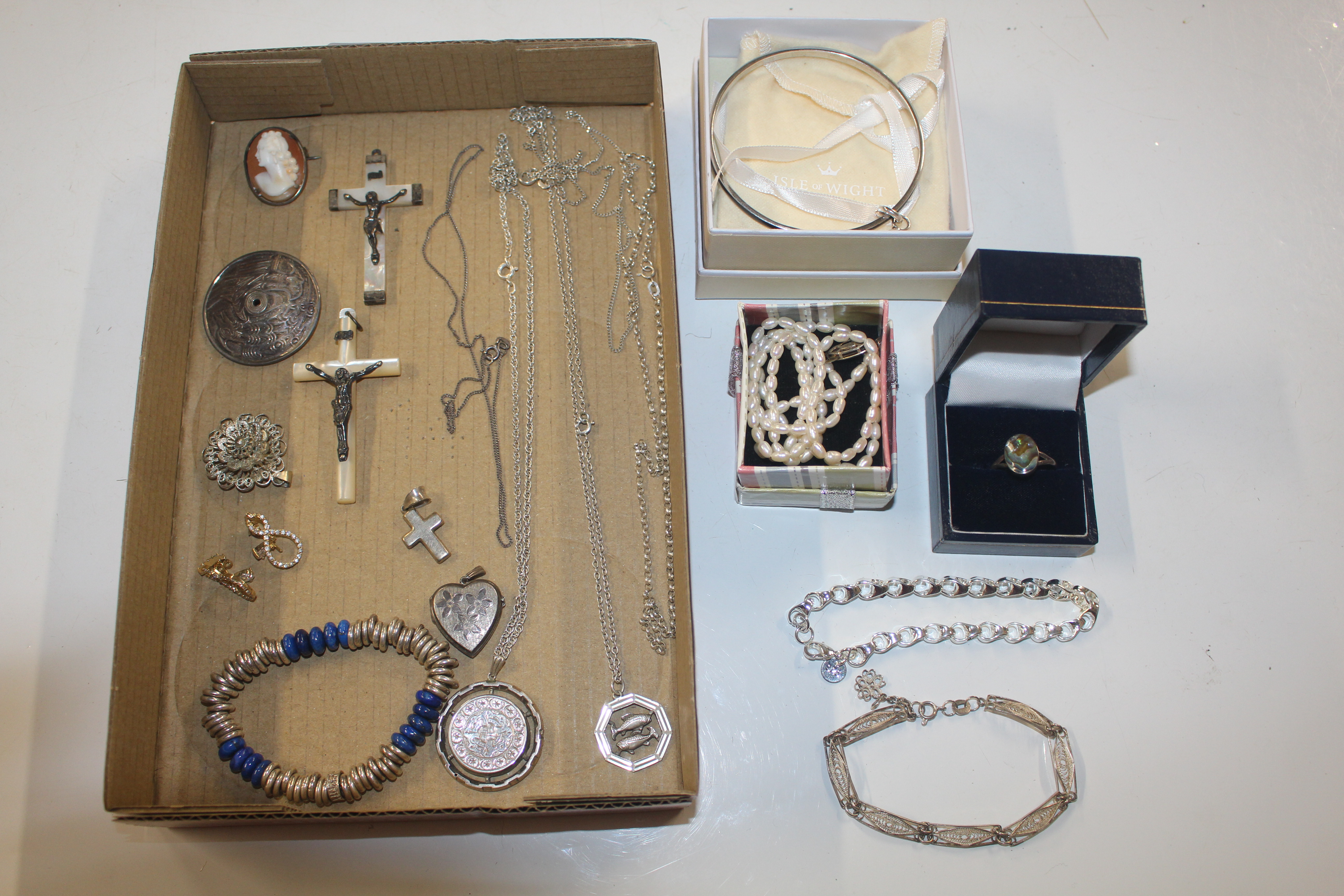 A box of mostly silver jewellery