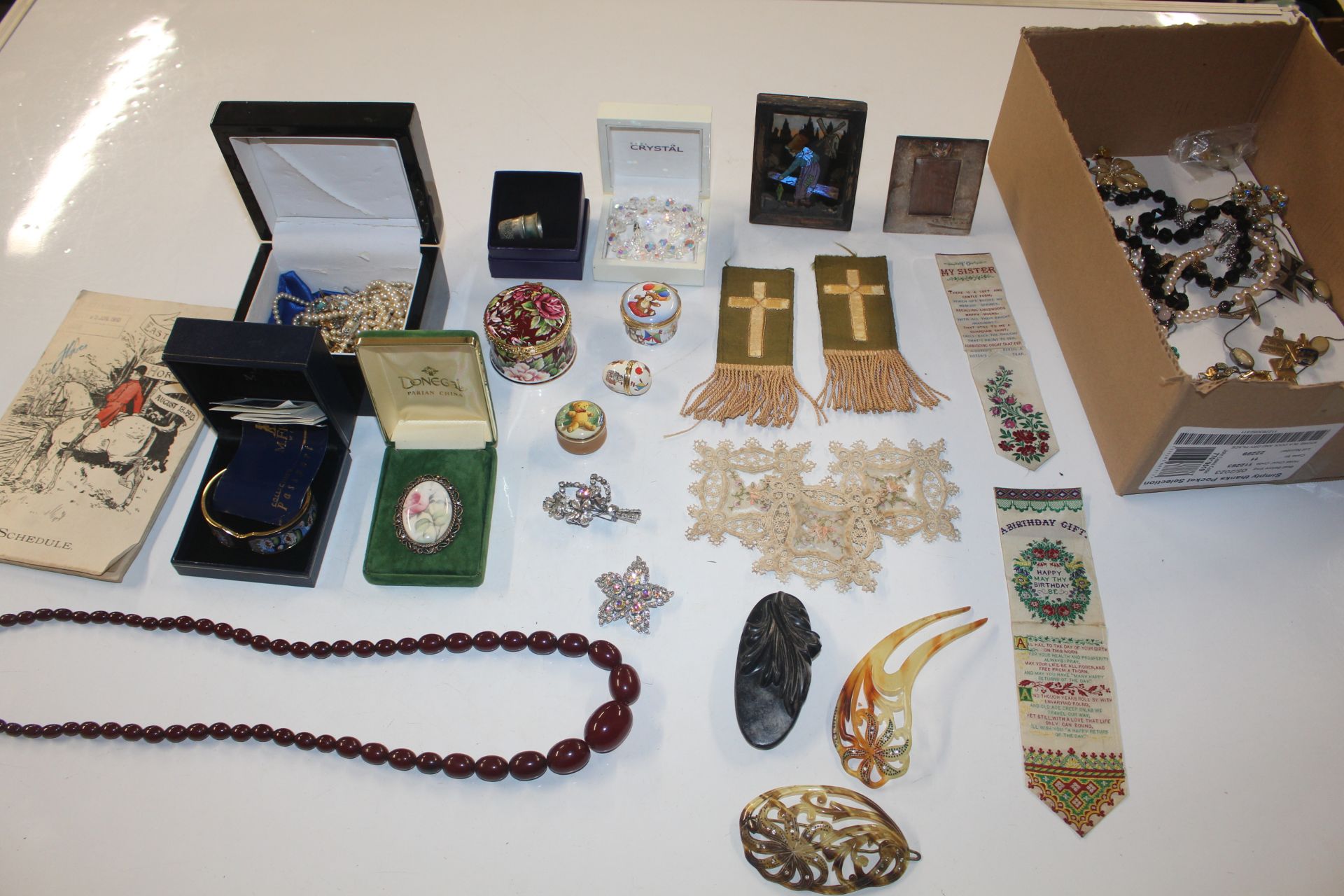 A box of various costume jewellery