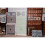 A vintage painted kitchen cabinet