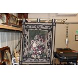 A tapestry effect wall hanging with pole
