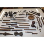 A box of various carved wooden items etc.