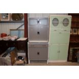 A vintage kitchen unit with enamelled pull out she
