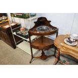 A mahogany bow fronted corner washstand