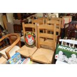 A set of six beech rough seated ladder back chairs