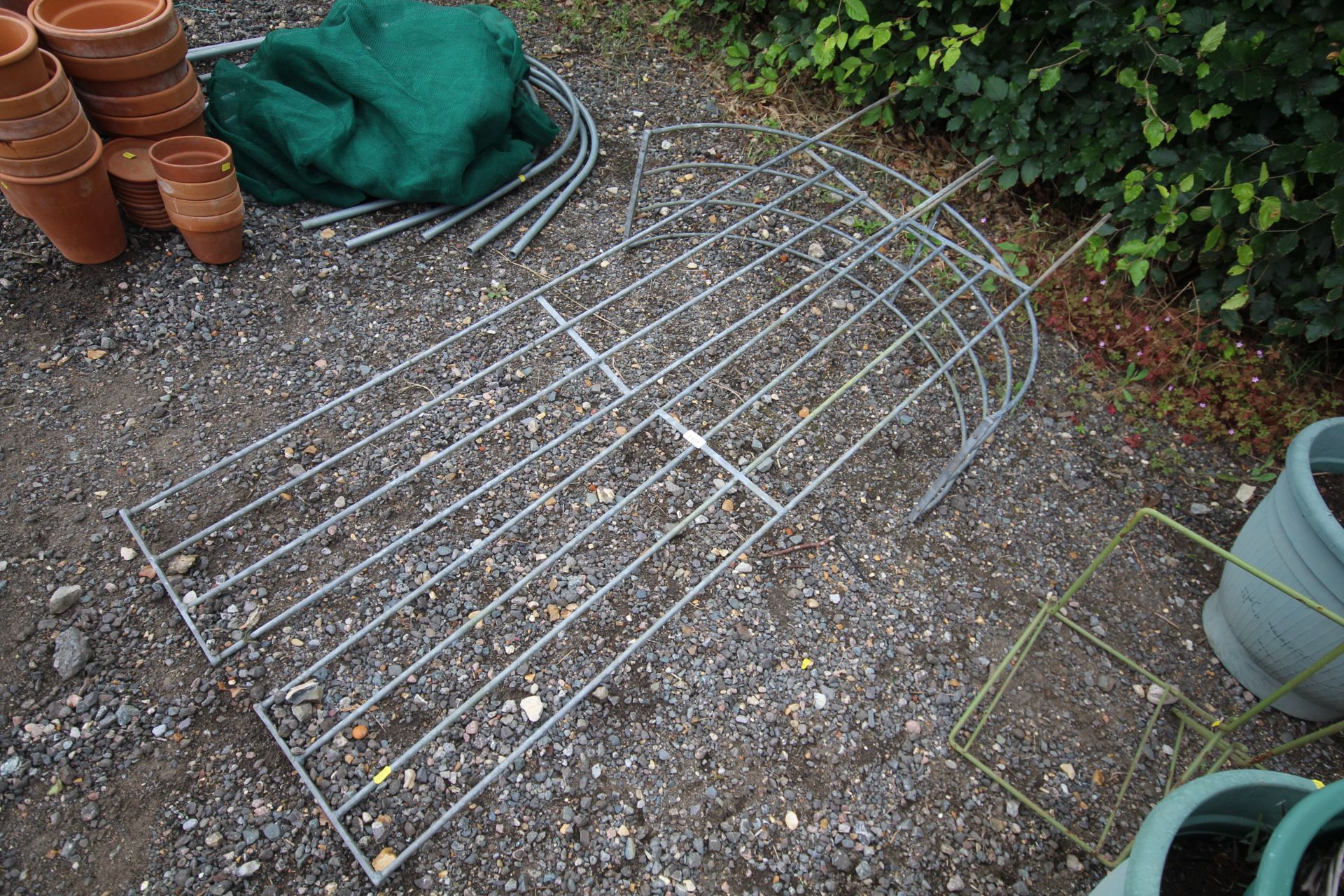 A galvanised garden arch