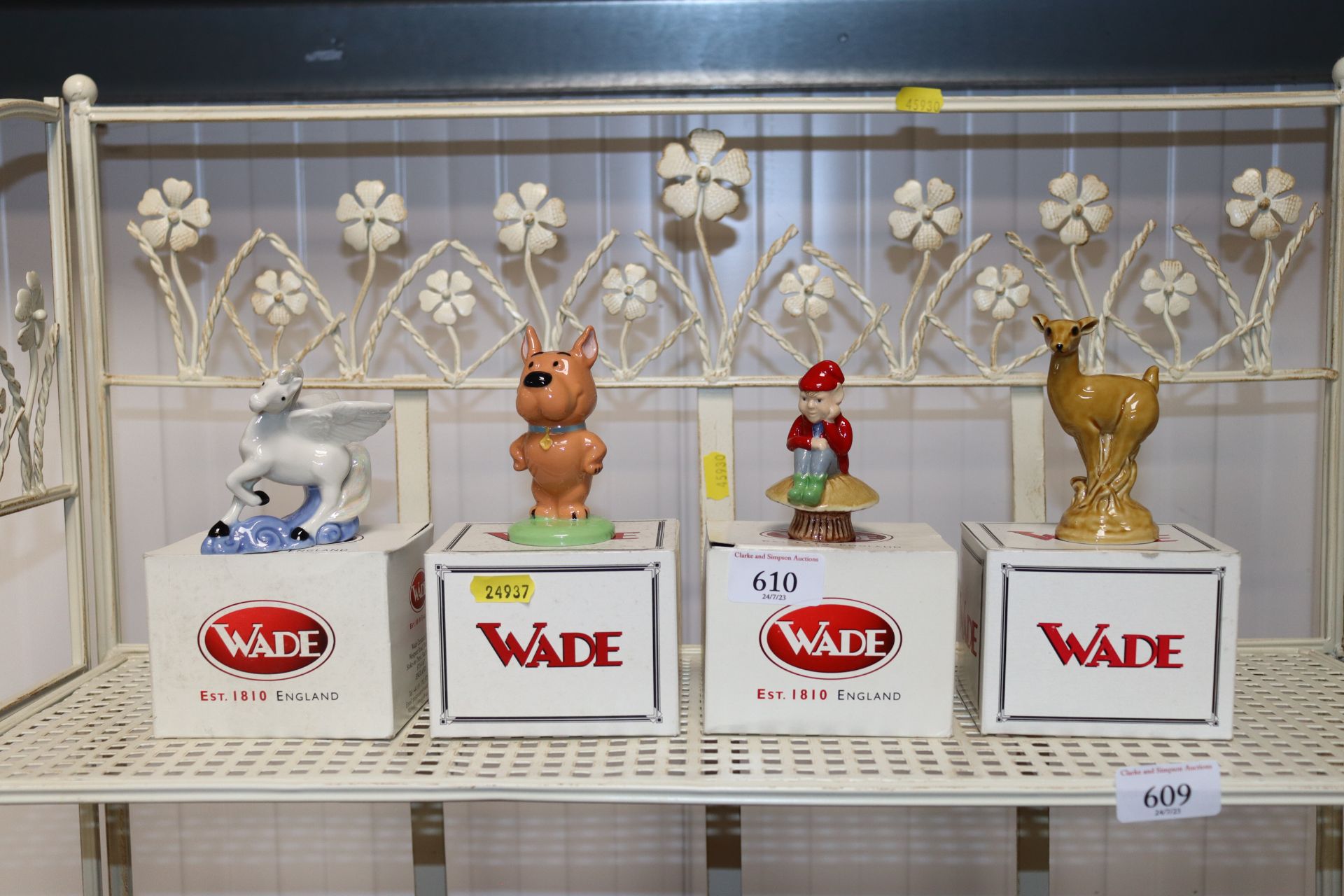 Four boxed Wade ornaments