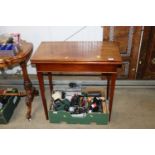 A 19th Century mahogany fold over tea table